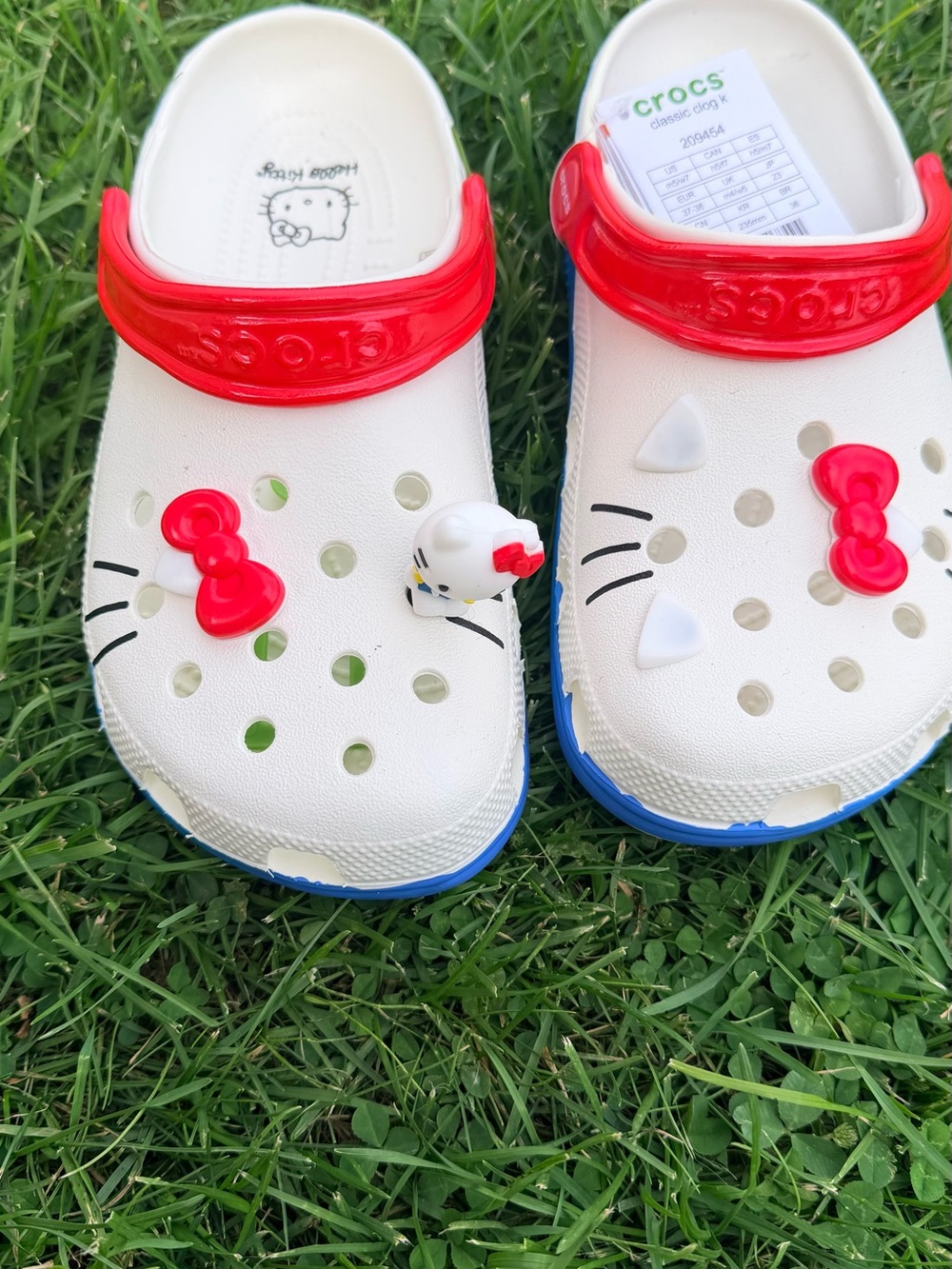 CROCS Kids White Clogs with Red Straps and Blue Outsoles